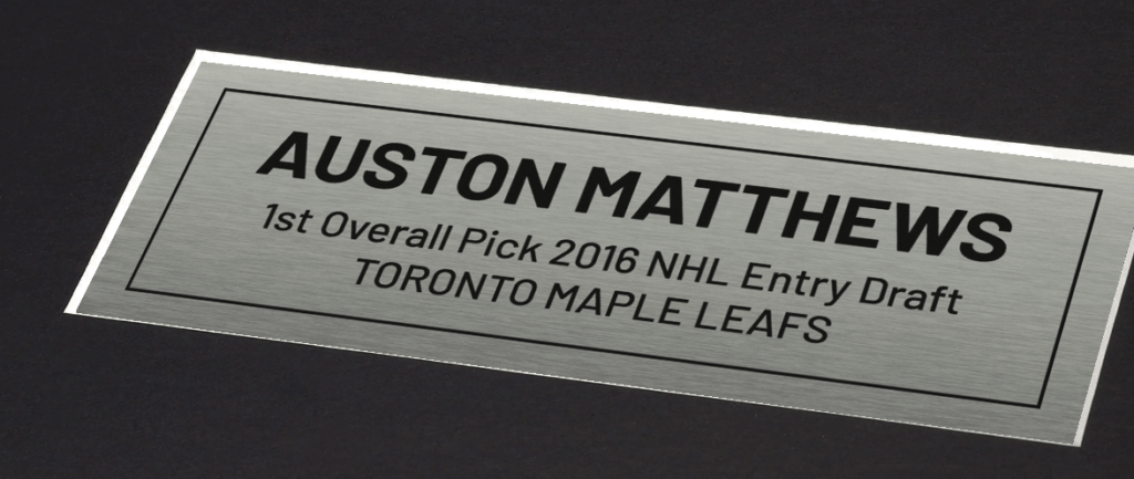 štítek se jménem hráče hliník